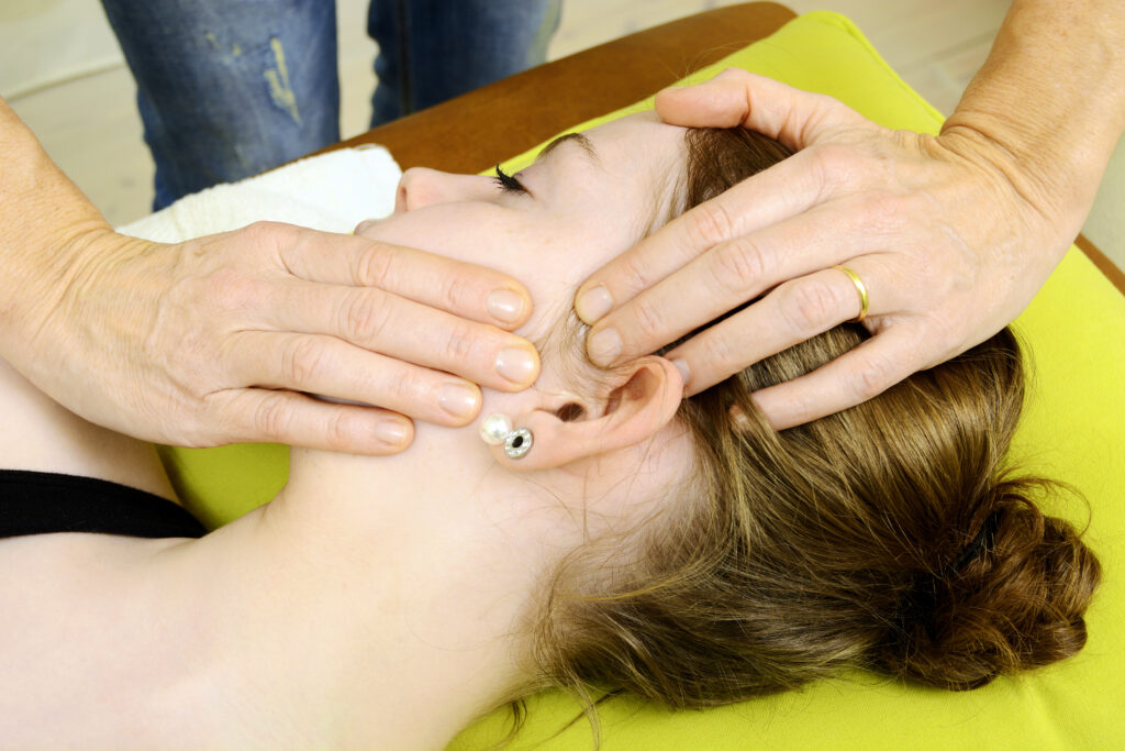 woman receiving TMJ Massage